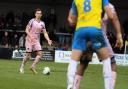 Retained midfielder James Dodd on the ball against Torquay United