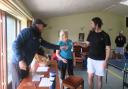 Winscombe head coach Mike Cook presenting the Mixed Doubles Winners' Trophy to Sally Thompson and Ant Moodie.
