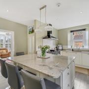 The open plan kitchen is a real showstopper of the main house