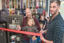 Owners Matt Stains and Stuart Walsh with Istar Staines-Singer cutting the ribbon to open Sk8 or Die.    Picture: MARK ATHERTON