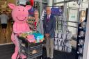 Weston's mayor Cllr Sonia Russe and her consort David Ray with Percy Pig in M&S Food Hall at Flowerdown Retail Park.