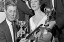 Secretary, Mollie Bliss is Shown some of the trophies won by Roger Hutchings, Michael Lock and Peter Betteridge.