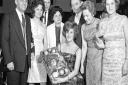 Star manageress Miss Beryl Bundock with the basket of fruit which was a prize at Marks and Spencer's staff dance, held at the Royal Hotel.