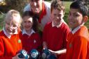 Bowls player Andrew Owens with pupils.