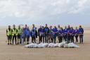Volunteers pictured with 80kg of rubbish found on Weston beach.