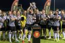 Bath City celebrate winning the Somerset Premier Cup after coming from behind to beat Paulton Rovers.