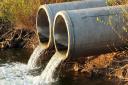 A picture of the pipes, dumping sewage directly into our rivers and lakes.