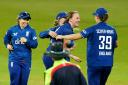 England's Lauren Filer (centre) celebrates taking the wicket of Sri Lanka's Achini Kulasuriya during the third women's Metro Bank One Day International match at the Uptonsteel County Ground, Leicester. Picture date: Thursday September 14, 2023.