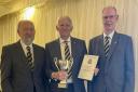 Club captain Chris Bryant (centre) and vice captain Dave Peakall (left) received the John Durston Cup for being Champions of the SBL Division One North.