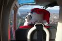 Santa training in his helicopter. Picture: Helicopter Museum