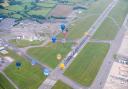 Balloons launching from Bristol Airport as part of the Exclusive Cup competition.