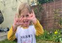 Three-year-old Mindy will walk a mile to raise money for her nan.