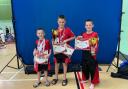From left to right, Ryan Cawte, Liam Cawte and Josh Cawte pose for the camera after their success at the Great Britain Championships.