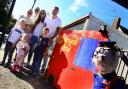 The Wilkins family and friends with a Postman Pat scarecrow display in Brent Knoll last year.