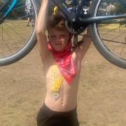 Riley Charlton, 9, completed his 70 mile cycle at Weston.