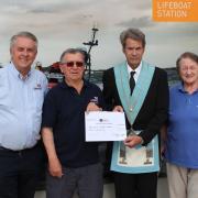 The Masonic Master hands a cheque to Weston's RNLI. (L-R) Christopher Ware RNLI operations manager, Peter Elmont RNLI fundraising chairman, Stephen Fry Masonic Master, Judith Hayes RNLI fundraising Treasurer.