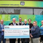 A cheque was presented to Second Step's Safe Haven centre from Howards Motor Group. (L-R) Chris Lee, Peter Haynes, Cllr James Clayton, Aileen Edwards, Jason Parker, Star Davey, Tammie Hemmet.