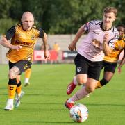 James Waite in action for Newport County against former side Weston AFC.