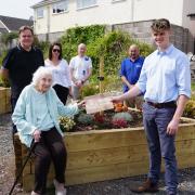 Stanley’s Garden, Worle, helps those with dementia plant flowers for each of the senses. Front from left: Muriel Skidmore and Peter Thatcher. Back from left: David Skidmore, Kelly March, Wayne Matthews and Simon Burr.