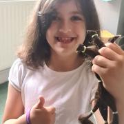Eight-year-old Faith has chopped off 11″ of her hair to donate to the Little Princess Trust charity.