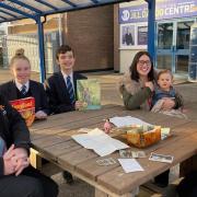 Teachers and students inspect the time capsule. (L-R) COO at Priory Learning Trust Mark Antoine, students Kaitlyn and Lewis, Charlotte Antoine and maths teacher at Worle Laura John.