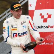 Will Burns celebrates his podium finish at Oulton Park.