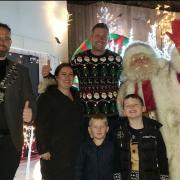 Father Christmas and the mayor of Weston visited the Firth family's charity lights.