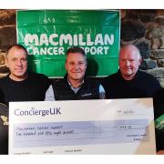 From left to right, Kelly Hillier (fundraiser) Matt Tyler (ConciergeUK) Wayne Hadley (ConciergeUK) Phil Hucker (Manchester United Legends Team Manager) and Lisa Konkol (Fundraiser) with the cheque of £558 for MacMillan Cancer Support.