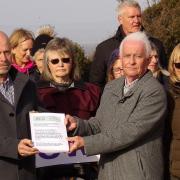 Cllr Mark Canniford being handed a petition by Birnbeck Conservation Group.