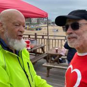 Paul Hobbs with Michael Eavis after his last record-setting fundraiser.