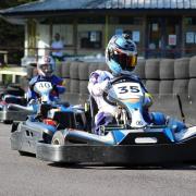Charlotte Ozanne go-karting on the Castle Combe circuit.