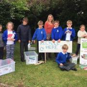 Julie Leader with Shipham First students at the school's recycling point.