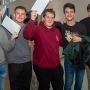 Students celebrating their GCSE results at Hans Price Academy.