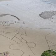 Ron and Russel Mael from the Sparks, drawn on Brean beach by artist Simon Beck.