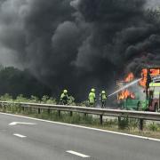 A double-decker bus caught fire on the M5 this afternoon (Friday).  Picture: Mark Kidner