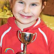 Natalie with the King Cup, awarded for the most points in the under five's category.
