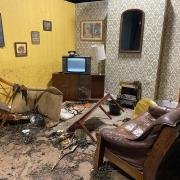 The reconstructed, flood-damaged 1980s sitting room.