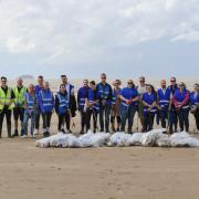Volunteers pictured with 80kg of rubbish found on Weston beach.