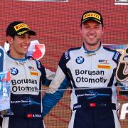 Will Burns celebrates his maiden overall podium finish with Berkay Besler in the GT4 European Series finale at Circuit de Barcelona-Catalunya in Spain.
