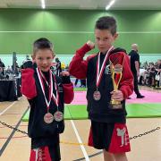 Ryan Cawte (left) picked up a silver and bronze medal and Josh Cawte (right) won the sparring event, crowned English Champion and claimed a silver medal at the WUMA English Championships. Pic: Will Cawte.