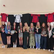 A section of Winscombe Ladies Hockey Club award winners pose for the camera.