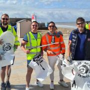 Seven bags of litter were collected in the beach clean. Picture: National Highways South West