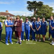 St Andrews captain of the day Sue Sinclair receives the Fear Cup runners-up trophy from Somerset county ladies' president Sandra Every.