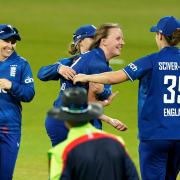 England's Lauren Filer (centre) celebrates taking the wicket of Sri Lanka's Achini Kulasuriya during the third women's Metro Bank One Day International match at the Uptonsteel County Ground, Leicester.