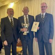 Club captain Chris Bryant (centre) and vice captain Dave Peakall (left) received the John Durston Cup for being Champions of the SBL Division One North.