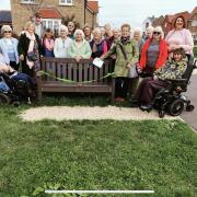 Members of Yatton Strawberry Hearts Women's Institute open their new Friendship Bench at The Strawberry Line.