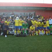The Weston squad celebrate the end to their season with the fans who made the long trip to Worthing