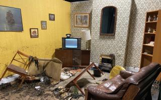 The reconstructed, flood-damaged 1980s sitting room.