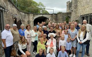 Ruby, middle, surrounded by family at Banwell Castle. Picture: Charlie Williams.
